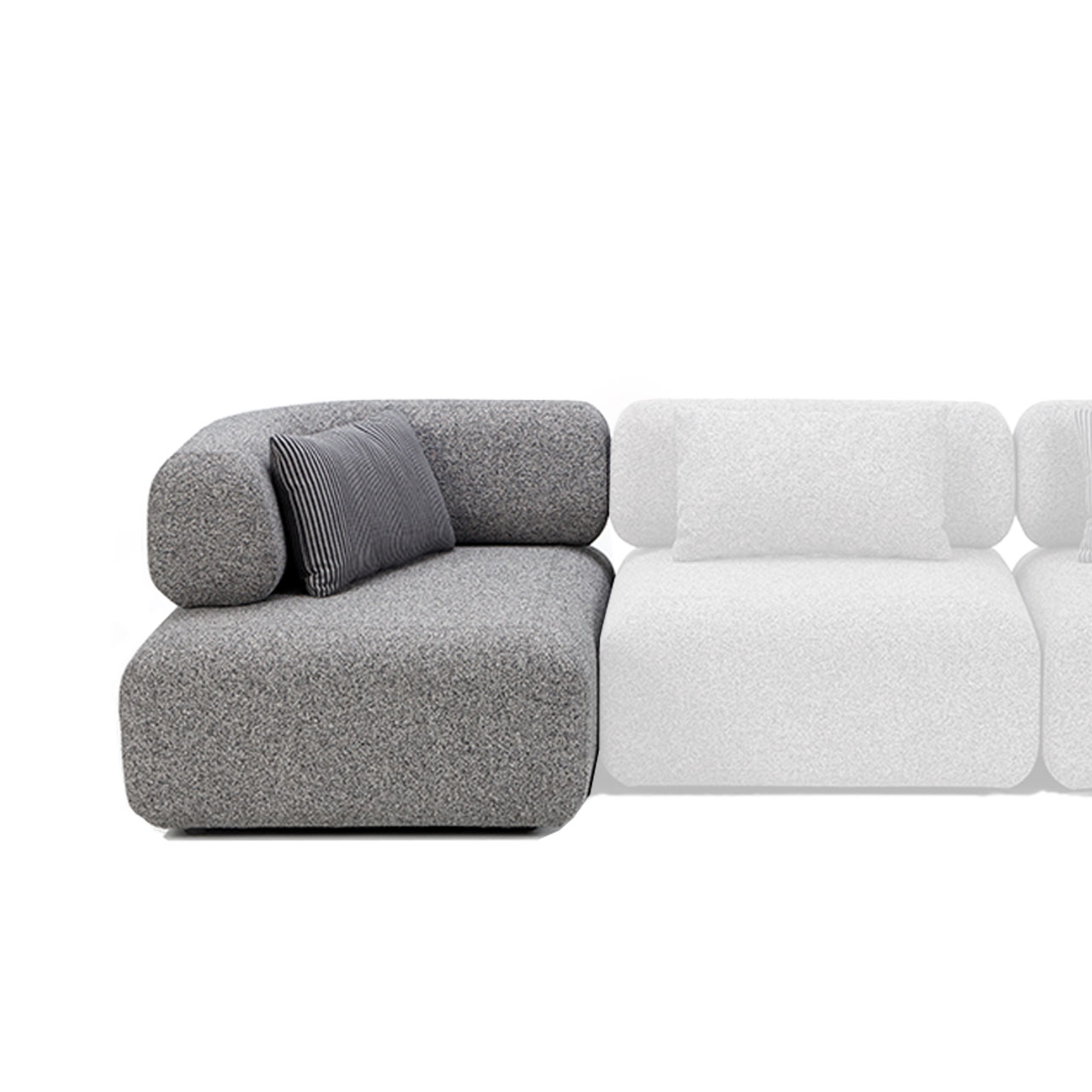 Ausschnitt einer grauen Polstergarnitur. Das linke Abschlusselement ist hervorgehoben.