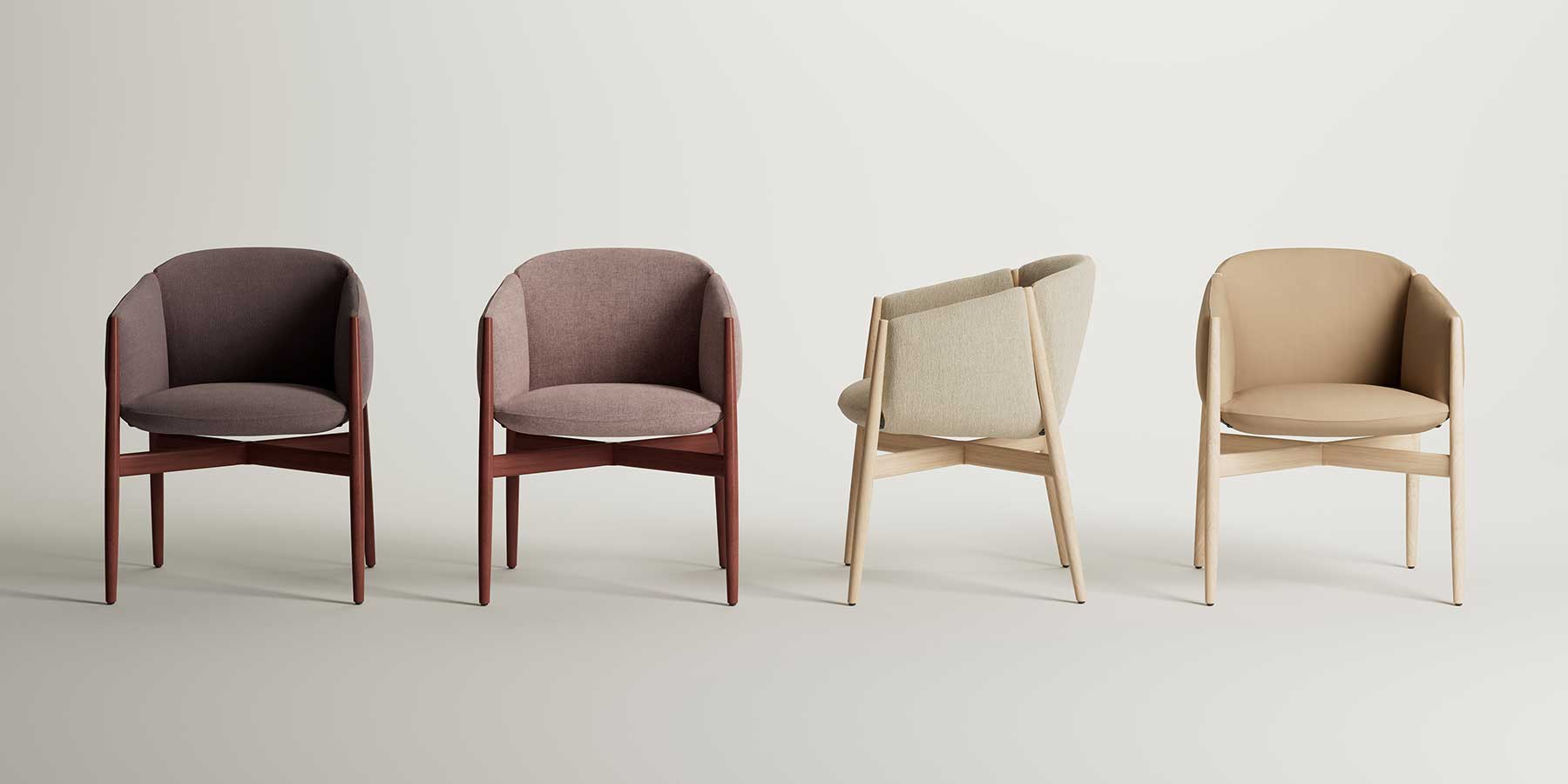 Vier Kagu Stühle stehen nebeneinander. Sie haben unterschiedliche Bezüge und Gestellfaraben.