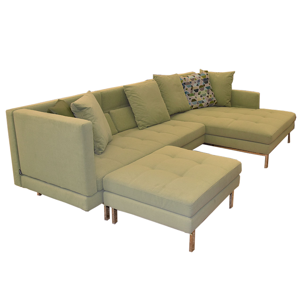 Eckgarnitur in grünem Stoff mit passendem Hocker.