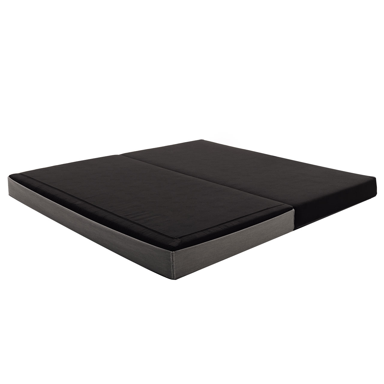 Das Schlafelement ist aufgeklappt, die schwarze Oberfläche sichtbar.