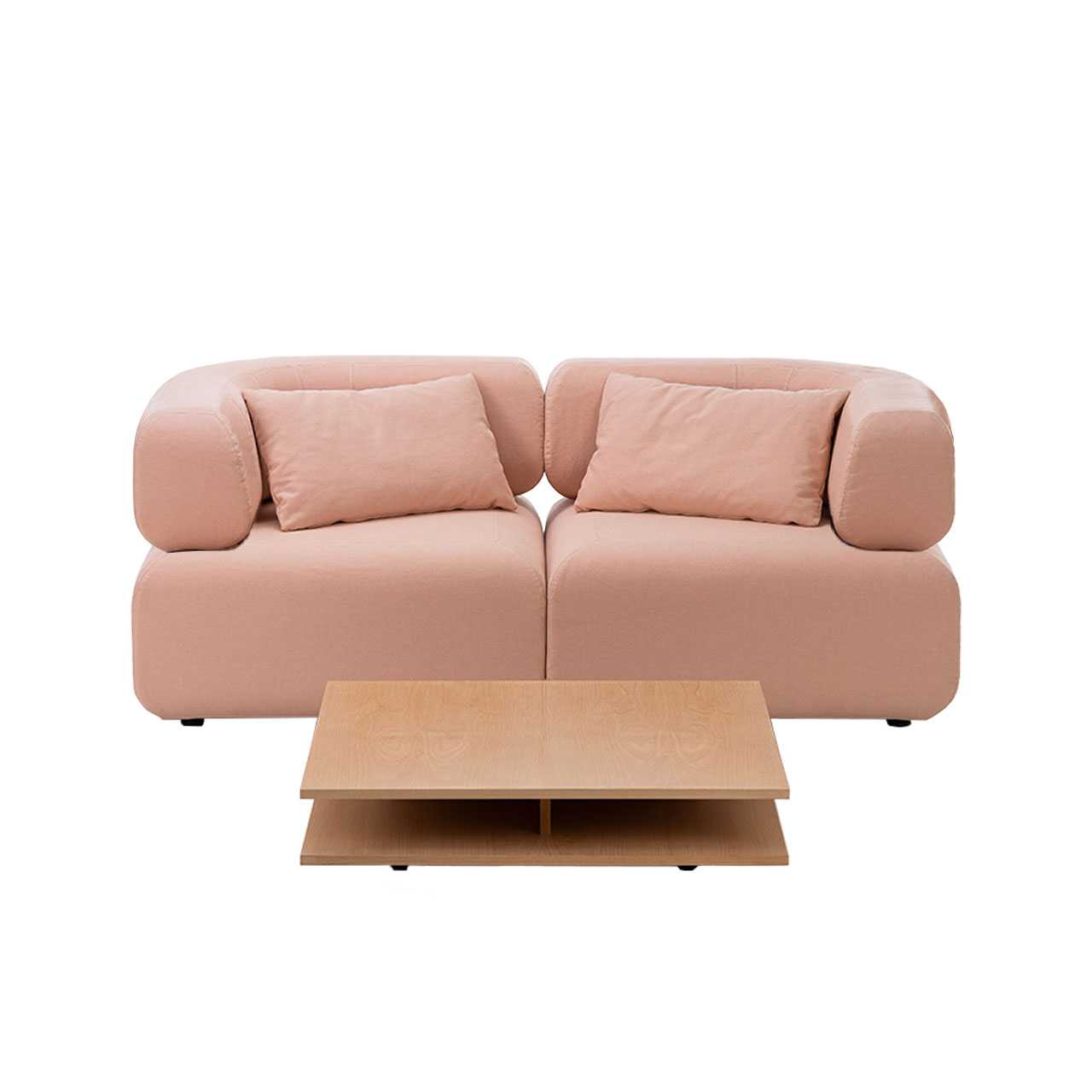 Zwei Abschlusselemente mit je einer Armlehne rechts und links bilden einen Zweisitzer. Davor steht ein passender Tisch in warmem Holz.