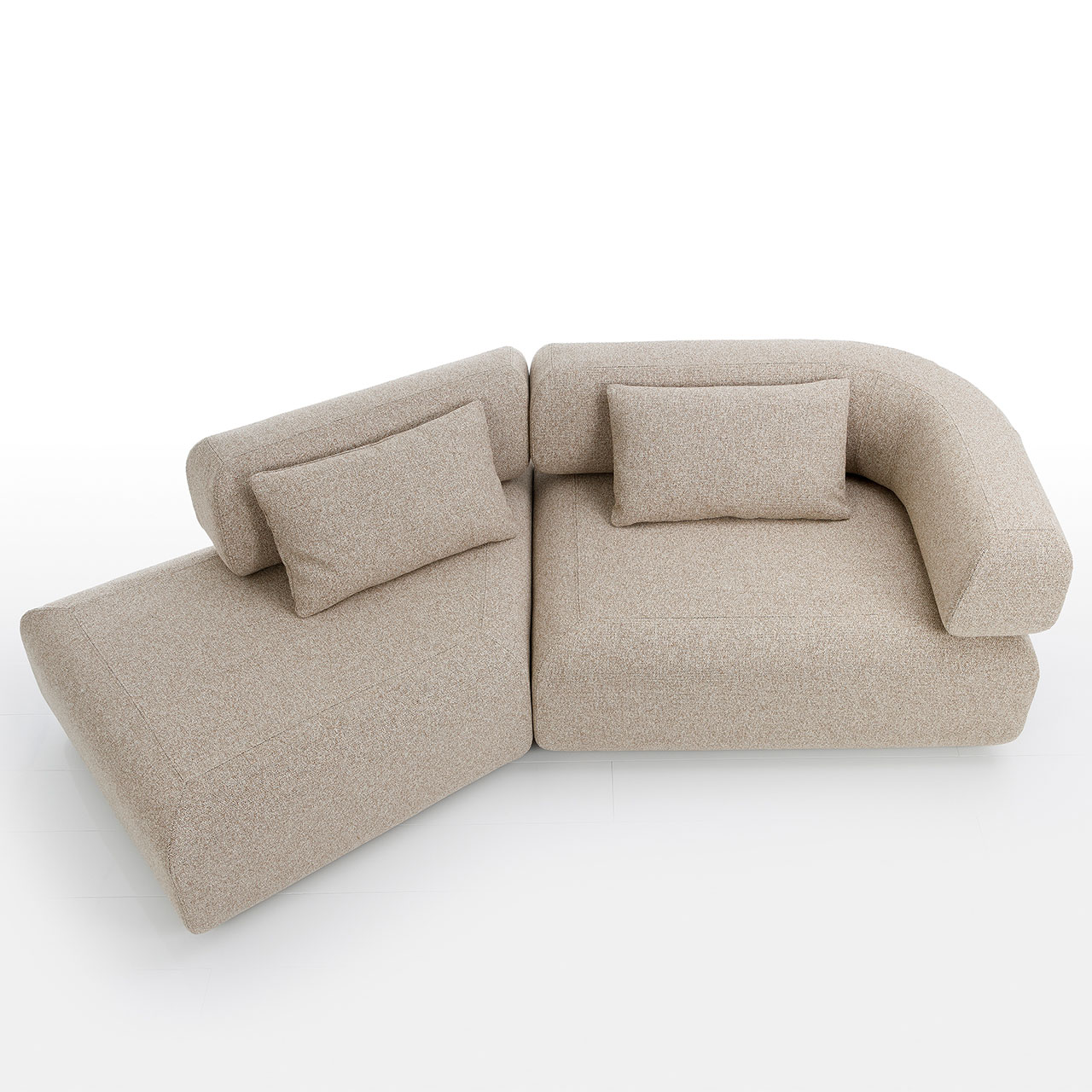 Eine beige Garnitur aus einem Eckelement rechts und einem Trapezelement links. 