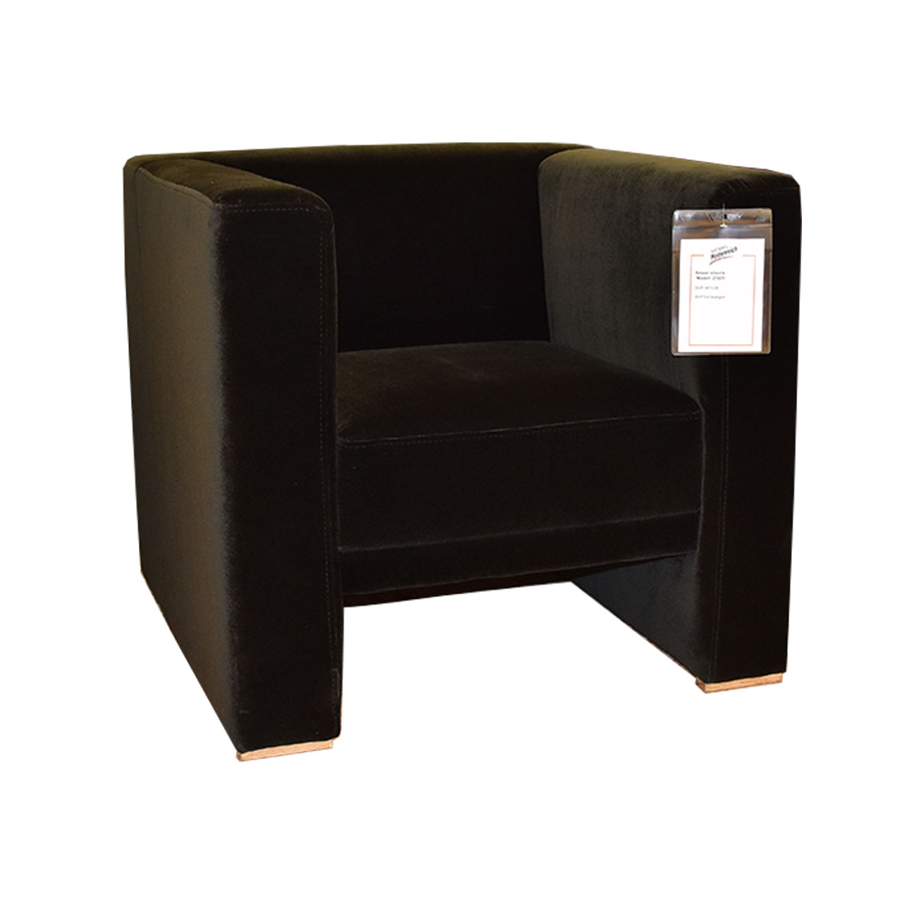 Sessel in Stoff in dunkelgrün.