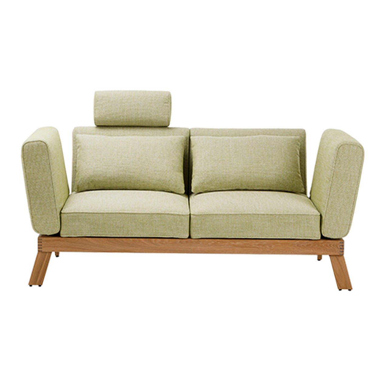 Sofa der Serie brühl lofoten Lounge mit Drehsitzen. Die Polster sind mit einem hellgrünen Stoff bezogen, das Untergestell ist in Eiche hell. 